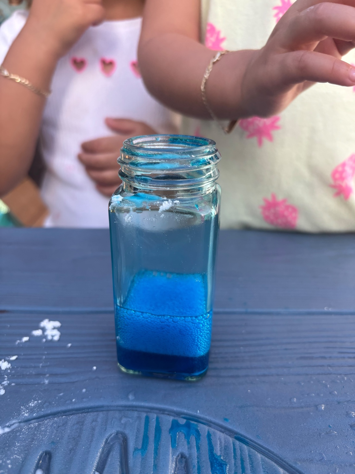Blue potion in clear jar